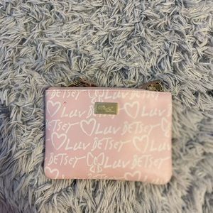 Pink Betsy Johnson over the shoulder/cross body bag.